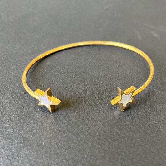 Pulsera esclava doble estrella nacar abierta dorado de acero quirúrgico